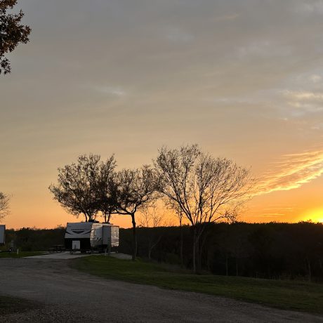 View of RV sites on a beautiful sunset at Hidden Valley RV Park